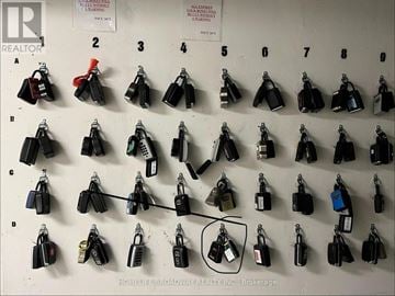 Toronto (Waterfront Communities) townhouse for rent - A wall of keys with one key circled.
