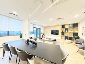 Surrey apartment for rent - A modern dining room with a large table and chairs.
