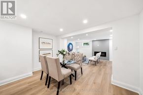 Newmarket (Central Newmarket) apartment for rent - A dining room with a table set for four.