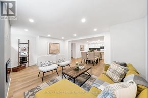 Newmarket (Central Newmarket) apartment for rent - A living room with a couch, chairs, and a coffee table.