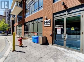 Toronto (Dovercourt-Wallace Emerson-Junction) condo for rent - A building with a sign that says 1420 on it.