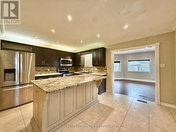 London South (South X) apartment for rent - A kitchen with granite countertops and stainless steel appliances.