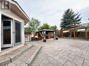 London South (South X) apartment for rent - A backyard with a patio and a gazebo.