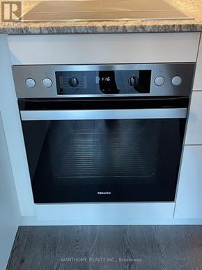 Toronto (Banbury-Don Mills) condo for rent - A modern, clean, and well-lit kitchen with a built-in oven.