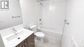 Toronto (Humber Heights) condo for rent - A white bathroom with a sink, toilet and shower.