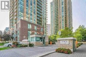 Toronto (Willowdale East) condo for rent - A sign in front of a building entrance reads 26-28.