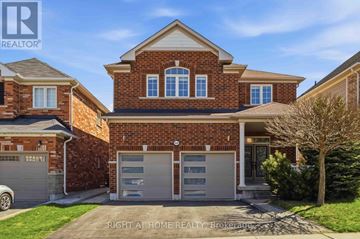 Oshawa (Taunton) apartment for rent - A brick house with a garage is for sale.
