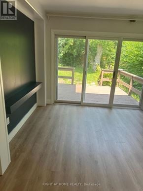 Mississauga (Clarkson) apartment for rent - A room with a sliding glass door leading to a deck.