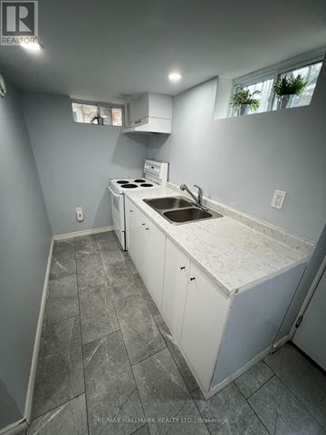 Toronto (Annex) apartment for rent - A kitchen with a white counter top and a sink.