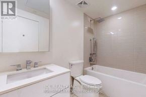 Toronto (Church-Yonge Corridor) condo for rent - A white bathroom with a sink, toilet and bathtub.