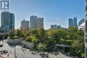 Toronto (Waterfront Communities) condo for rent - A cityscape with a Realty logo in the corner.
