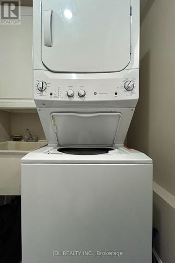 Toronto (Bayview Woods-Steeles) apartment for rent - A white dishwasher is in a kitchen.
