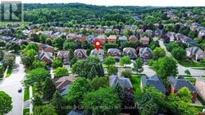 Aurora (Aurora Highlands) apartment for rent - A bird's eye view of a residential neighborhood with a red pin marking a specific house.