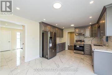 King (Nobleton) apartment for rent - A modern kitchen with a marble floor and a refrigerator with a water dispenser.