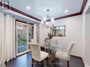 Oshawa (Donevan) apartment for rent - A dining room with a glass table and chairs.
