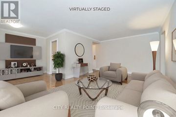 Toronto (Church-Yonge Corridor) condo for rent - A living room with a white couch and a glass coffee table.