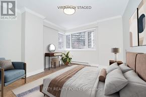Toronto (Church-Yonge Corridor) condo for rent - A bedroom with a bed, a chair, and a painting on the wall.