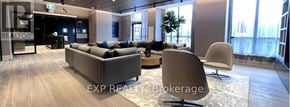 Toronto (East End-Danforth) condo for rent - A living room with a couch, chairs, and a rug.