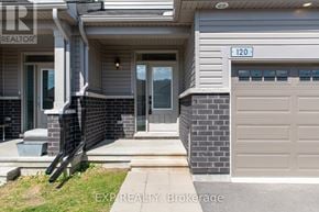 North Grenville townhouse for rent - A house with the number 120 on the front.