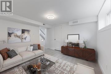 Toronto (Mount Pleasant West) apartment for rent - A living room with a white couch and a coffee table.