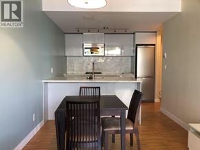 Vancouver apartment for rent - A kitchen with a table and chairs.