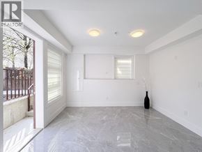 Vancouver apartment for rent - A room with a marble floor and a vase on the floor.