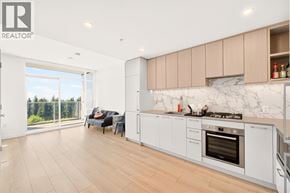 Burnaby apartment for rent - A modern kitchen with a marble backsplash and wooden flooring.