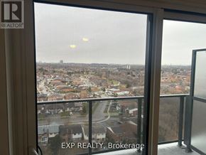 Mississauga (Mississauga Valleys) condo for rent - A view from a window looking out at a residential area.