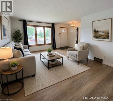 St. Catharines apartment for rent - A living room with a couch, chair, and coffee table.