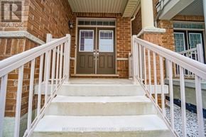 Markham (Cornell) apartment for rent - A front porch with a white railing and a brown door.