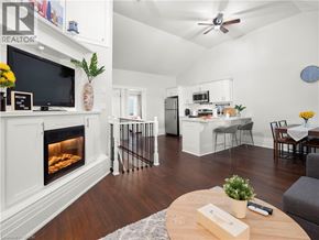 Hamilton apartment for rent - A living room with a fireplace and a television.