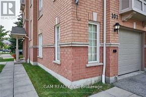 Mississauga (East Credit) townhouse for rent - A red brick house with the number 101 on it.