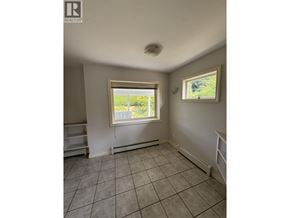 Vancouver apartment for rent - A room with a window and a tiled floor.