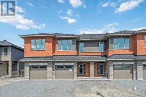 Ottawa townhouse for rent - A modern two-story house with a brick facade and multiple garage doors.