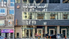 Toronto (North St. James Town) condo for rent - The Gupta Group building with a Day Nite Cannabis store in front.