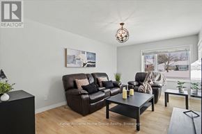 Cambridge apartment for rent - A living room with a brown leather couch and a black coffee table.
