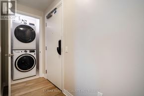Milton (Walker) condo for rent - A laundry room with a washer and dryer.