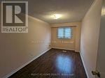 Mississauga (Creditview) apartment for rent - A room with a wooden floor and a window.