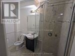 Mississauga (Creditview) apartment for rent - A bathroom with a toilet, a sink and a shower.
