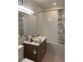 Vancouver apartment for rent - A bathroom with a sink, toilet, and shower.