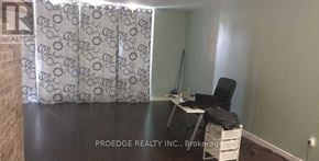 Toronto (Crescent Town) condo for rent - A room with a desk and chair in it.