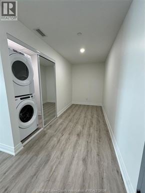 Windsor condo for rent - A laundry room with a washer and dryer built into the wall.