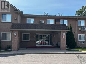Welland (Prince Charles) condo for rent - A building with a sign that says REALTOR in the top left corner.