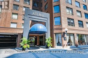 Toronto (Bay Street Corridor) condo for rent - The entrance to a building with the sign 633 Bay.