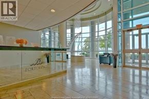 Windsor condo for rent - A realtor office with a glass wall and a sign that says Portofino.