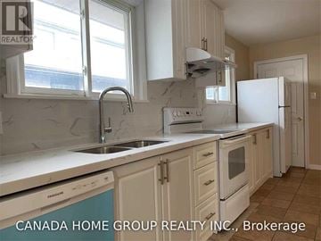 Mississauga (Erindale) apartment for rent - A kitchen with a sink, dishwasher, and refrigerator.