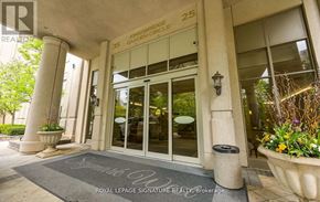 Mississauga (Hurontario) condo for rent - The front of a building with a glass door and a sign that reads "Knightsbridge Garden Club".