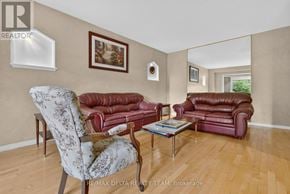 Ottawa apartment for rent - A living room with a chair, sofa, and coffee table.
