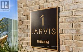 Hamilton (Beasley) condo for rent - A sign for Jarvis Emblem is displayed on a brick wall.