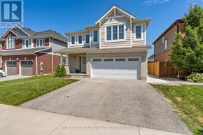 Pelham (Fonthill) apartment for rent - A large, two-story house with a garage is for sale.